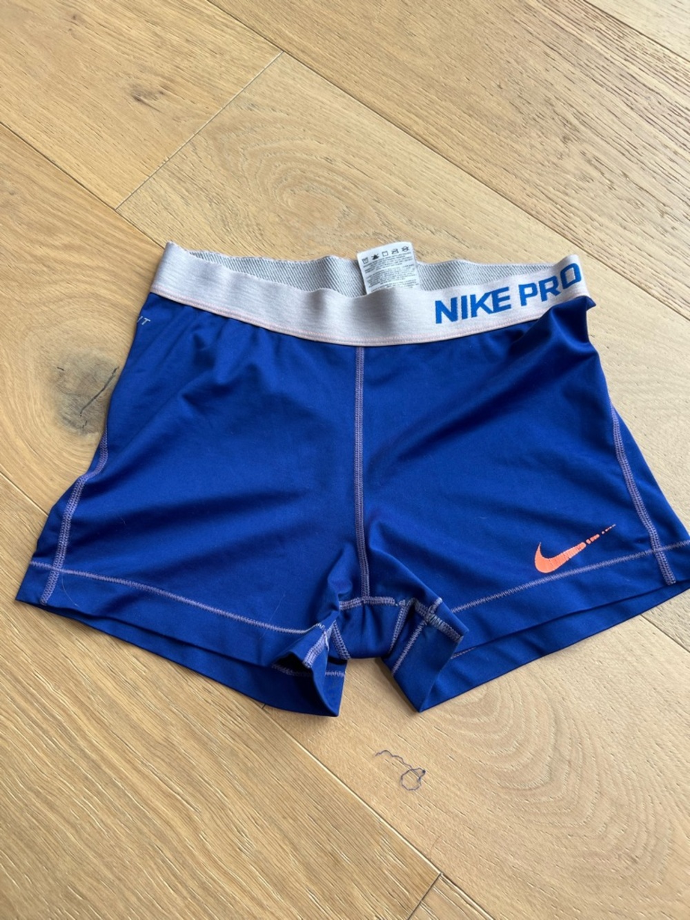 Nike Royal Blue Compression Shorts with Coral Swoosh